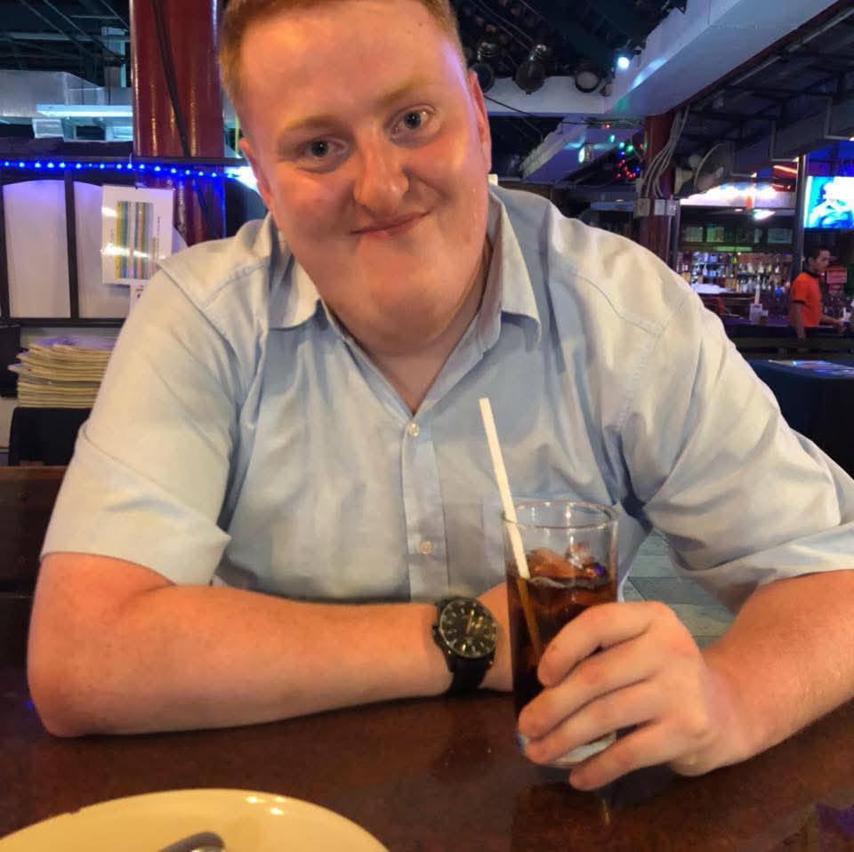 Justin Chappell sitting at a table