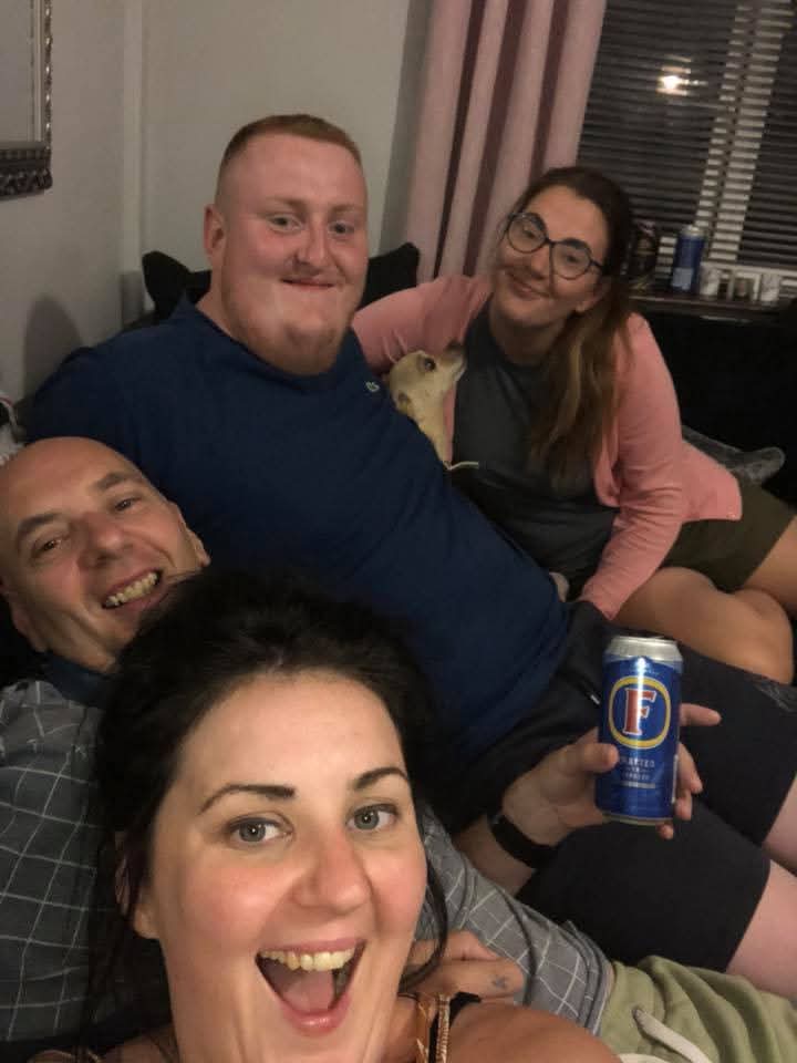 Justin at home with family during an evening gathering